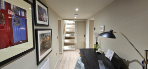 Basement office and stairs after the conversion