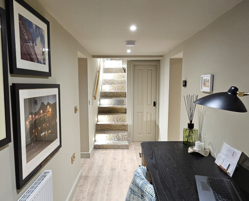 Basement office and stairs after the conversion