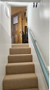 Steps going up from the basement